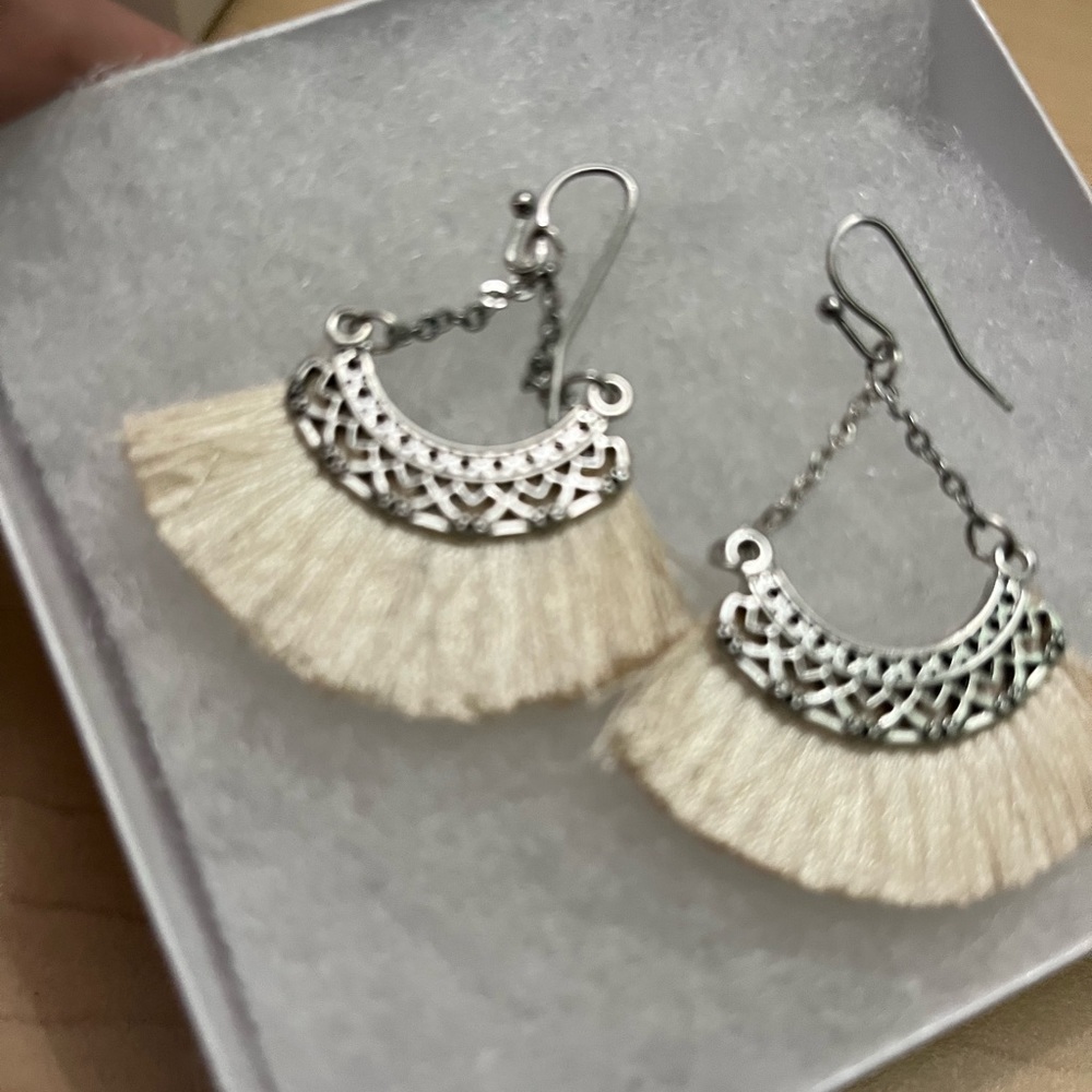 Silver and cream earrings